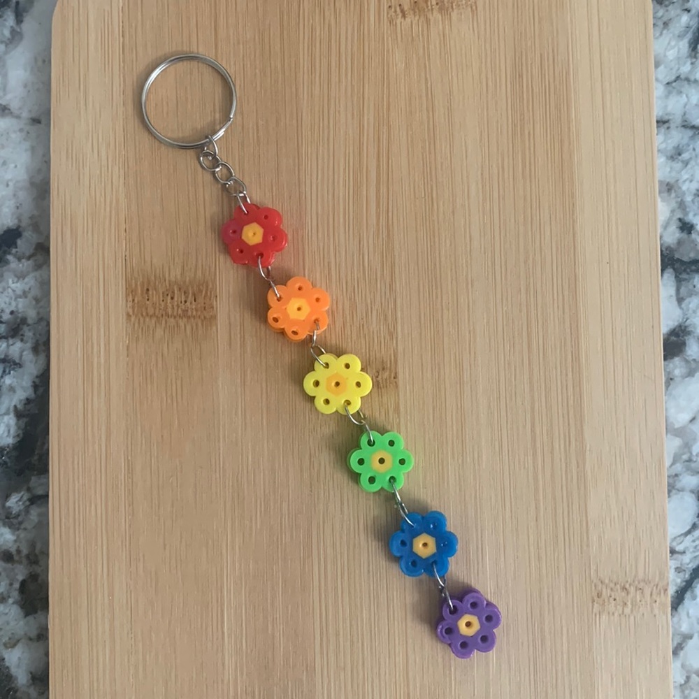Handmade rainbow flower keychain.